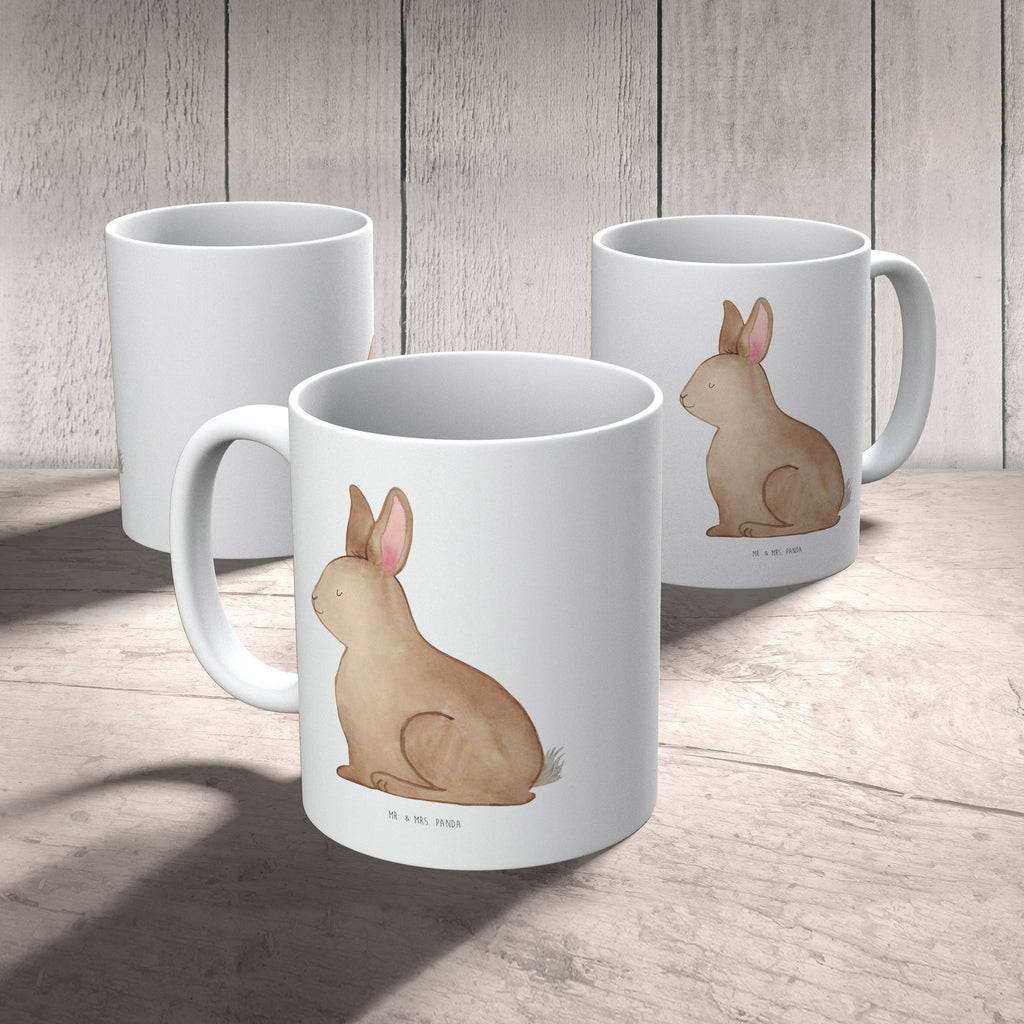 Tasse Hase sitzend Ostern, Frohe Ostern, Ostergrüße, Osterblume, Liebe, Grüße, Osterhase, Hase, Kaninchen Becher, Kaffeetasse, Kaffeebecher, Tee, Frühstück, Büro  Ostern, Osterhase, Ostergeschenke, Osternest, Osterdeko, Geschenk zu Ostern