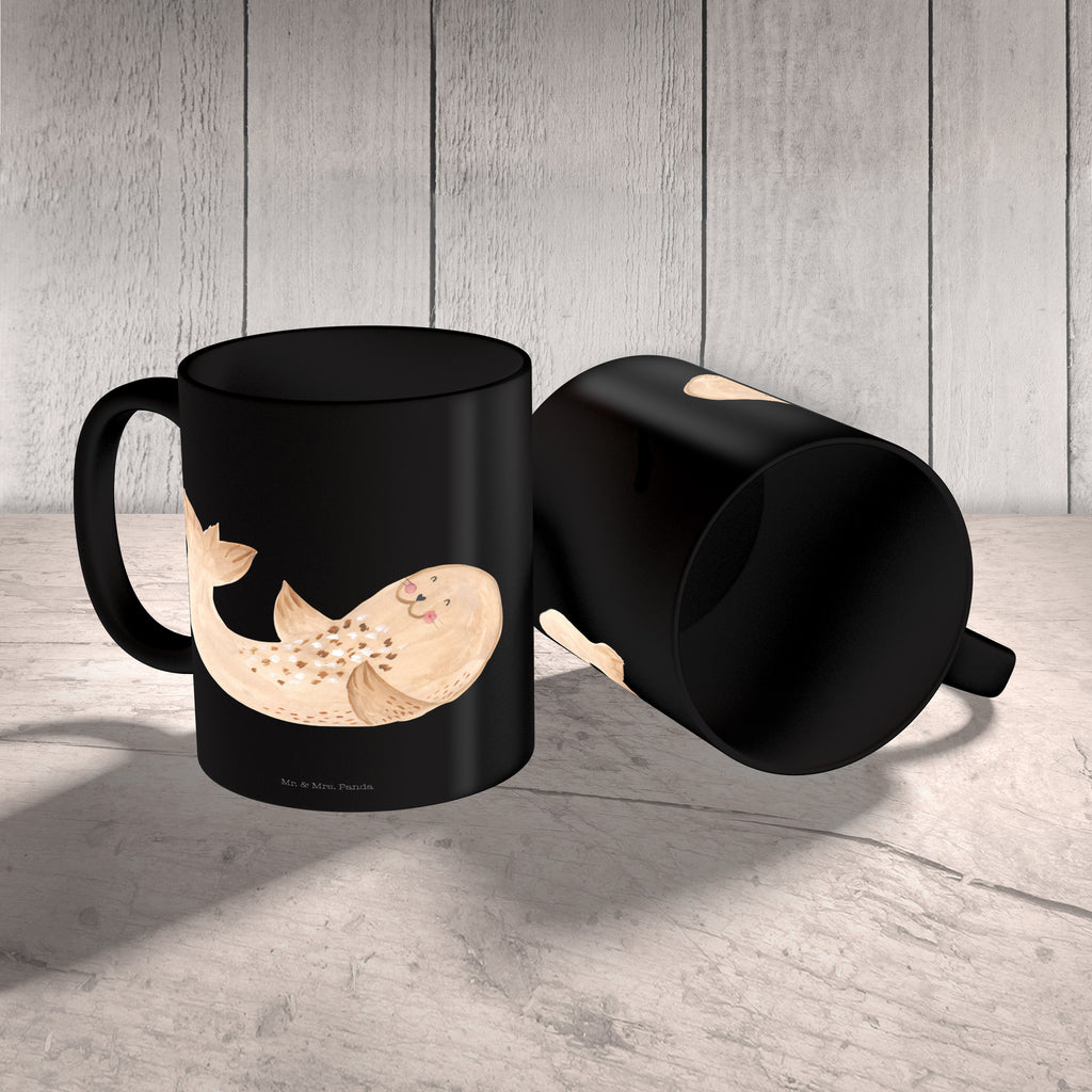 Tasse Robbe liegend Robbe, Robben, Seehund, Strand, Meerestier, Ostsee, Nordsee, Lachen, Freude Becher, Kaffeetasse, Kaffeebecher, Tee, Frühstück, Büro  süße Tiermotive, gute Laune, lustige Sprüche, Tiere