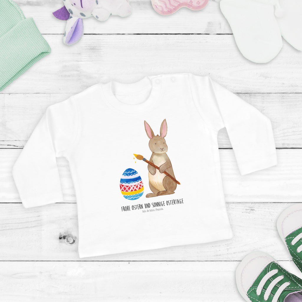 6-12 Monate Baby Longsleeve Hase Eiermalen Mädchen, Jungen, Baby, Longsleeve, Langarm, Bio, Kleidung, uni, Langarmshirt, Ostern, Osterhase, Ostergeschenke, Osternest, Osterdeko, Geschenk zu Ostern, Frohe Ostern, Ostergrüße, Osterblume, Osterei, bemalte Ostereier, Hase, Kaninchen, Eiermalen