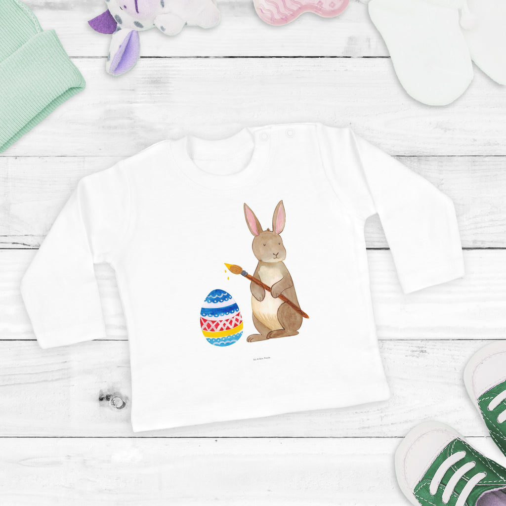6-12 Monate Baby Longsleeve Hase Eiermalen Mädchen, Jungen, Baby, Longsleeve, Langarm, Bio, Kleidung, uni, Langarmshirt, Ostern, Osterhase, Ostergeschenke, Osternest, Osterdeko, Geschenk zu Ostern, Frohe Ostern, Ostergrüße, Osterblume, Osterei, bemalte Ostereier, Hase, Kaninchen, Eiermalen