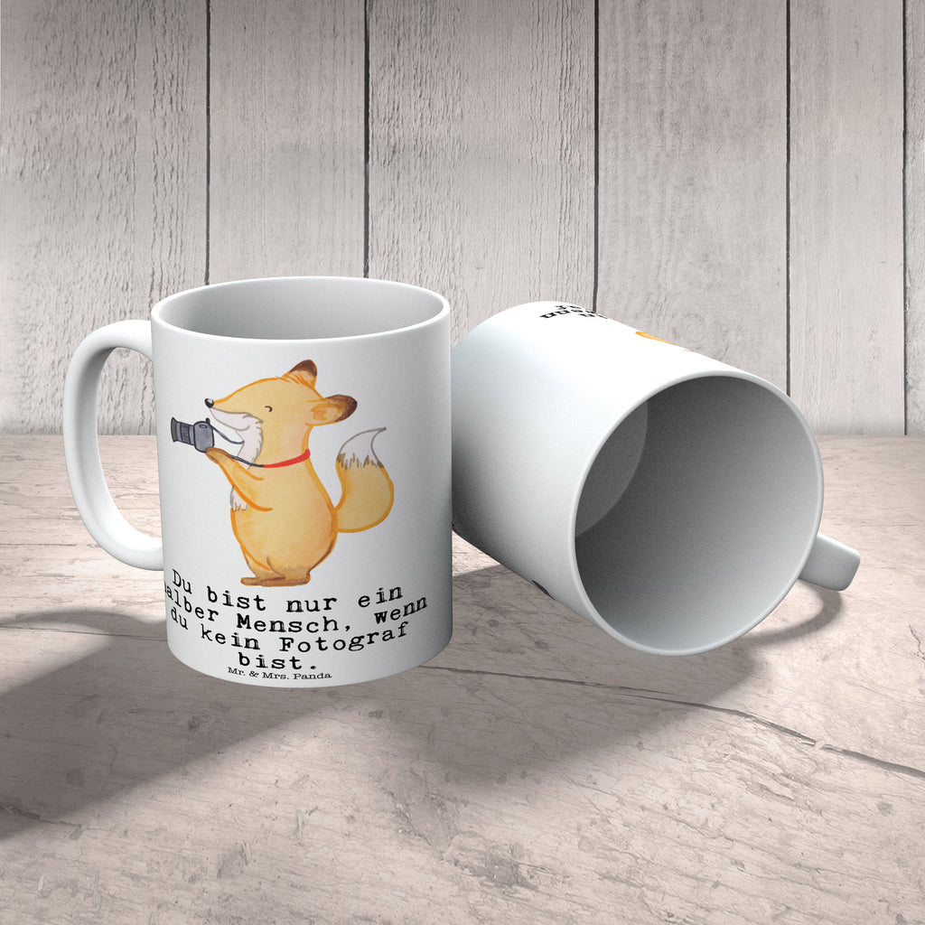 Tasse Fotograf mit Herz Fotograf, Fotoreporter, Hobbyfotograf, Hochzeitsfotograf, Ausbildung, Fotografie, Profi Fotograf Becher, Kaffeetasse, Kaffeebecher, Tee, Frühstück, Büro  Beruf, Ausbildung, Jubiläum, Abschied, Rente, Kollege, Kollegin, Geschenk, Schenken, Arbeitskollege, Mitarbeiter, Firma, Danke, Dankeschön