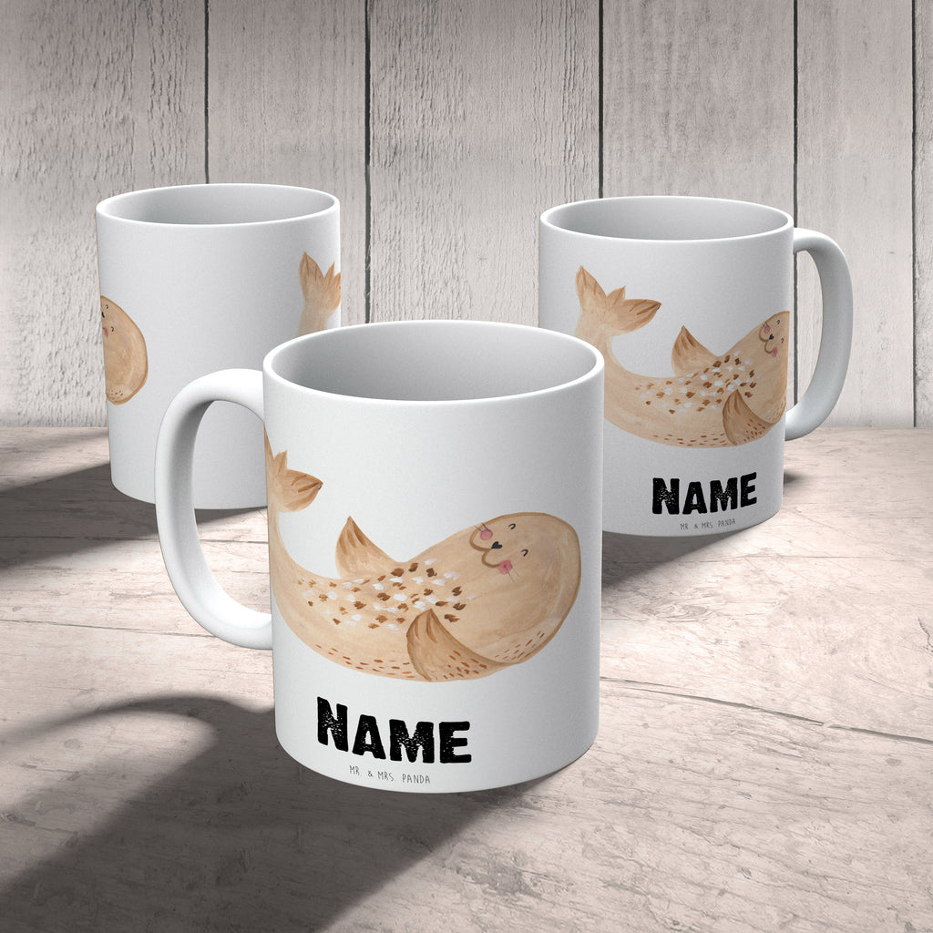 Personalisierte Tasse Robbe liegend Personalisierte Tasse, Namenstasse, Wunschname, Personalisiert, Tasse, Namen, Drucken, Tasse mit Namen, Tiermotive, Gute Laune, lustige Sprüche, Tiere, Robbe, Robben, Seehund, Strand, Meerestier, Ostsee, Nordsee, Lachen, Freude