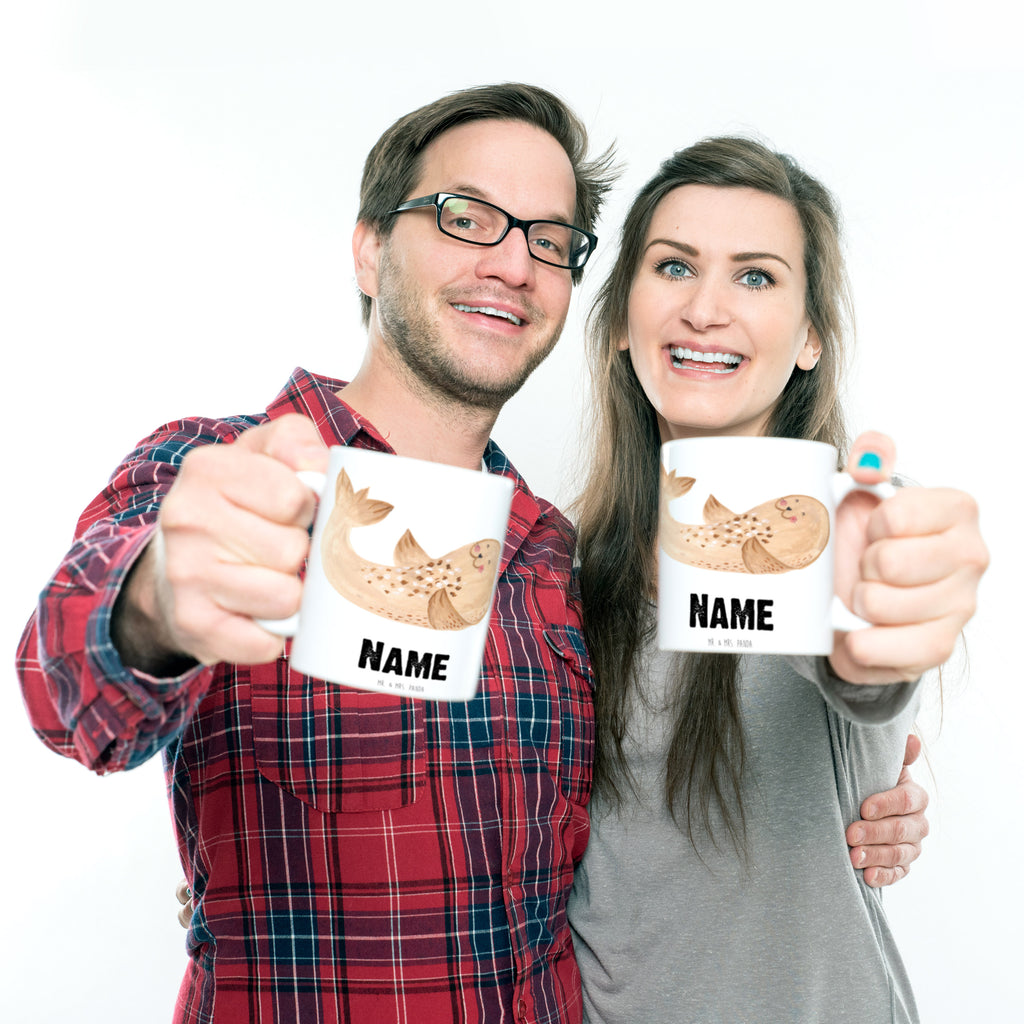 Personalisierte Tasse Robbe liegend Personalisierte Tasse, Namenstasse, Wunschname, Personalisiert, Tasse, Namen, Drucken, Tasse mit Namen, Tiermotive, Gute Laune, lustige Sprüche, Tiere, Robbe, Robben, Seehund, Strand, Meerestier, Ostsee, Nordsee, Lachen, Freude