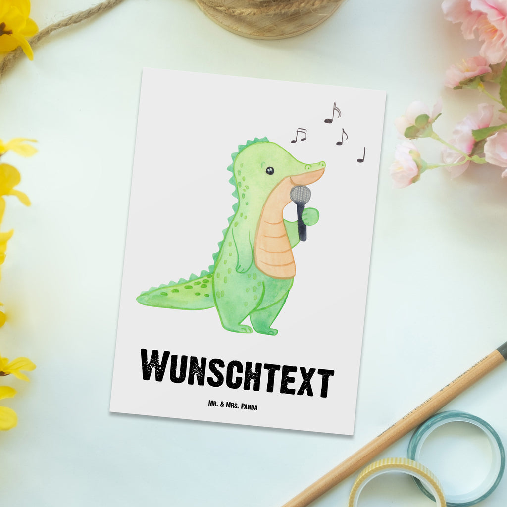 Personalisierte Postkarte Krokodil Singen Medizin Postkarte mit Namen, Postkarte bedrucken, Postkarte mit Wunschtext, Postkarte personalisierbar, Geschenkkarte mit Namen, Grußkarte mit Namen, Karte mit Namen, Einladung mit Namen, Ansichtskarte mit Namen, Geschenkkarte mit Wunschtext, Grußkarte mit Wunschtext, Karte mit Wunschtext, Einladung mit Wunschtext, Ansichtskarte mit Wunschtext, Geschenk, Sport, Sportart, Hobby, Schenken, Danke, Dankeschön, Auszeichnung, Gewinn, Sportler, Singen, Band, Live Auftritt, Gesang, Hobbysänger