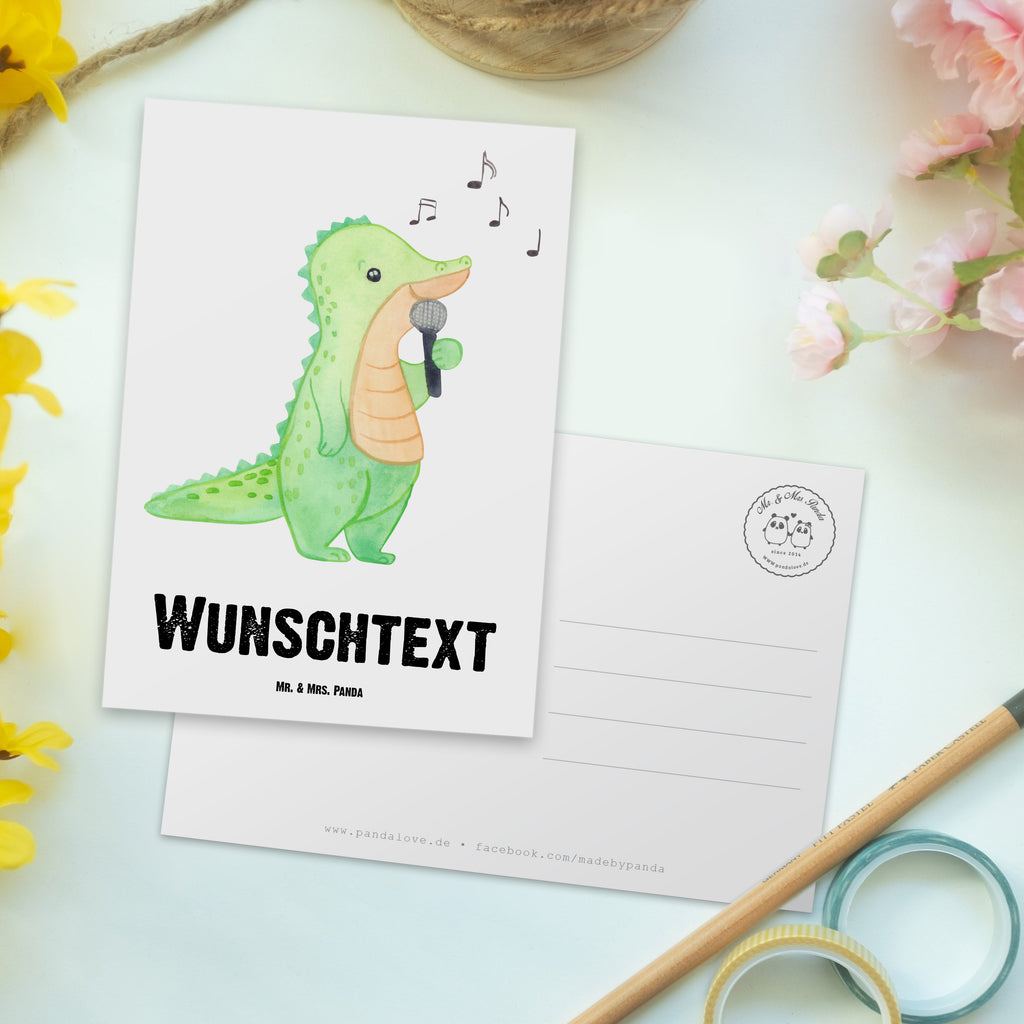 Personalisierte Postkarte Krokodil Singen Medizin Postkarte mit Namen, Postkarte bedrucken, Postkarte mit Wunschtext, Postkarte personalisierbar, Geschenkkarte mit Namen, Grußkarte mit Namen, Karte mit Namen, Einladung mit Namen, Ansichtskarte mit Namen, Geschenkkarte mit Wunschtext, Grußkarte mit Wunschtext, Karte mit Wunschtext, Einladung mit Wunschtext, Ansichtskarte mit Wunschtext, Geschenk, Sport, Sportart, Hobby, Schenken, Danke, Dankeschön, Auszeichnung, Gewinn, Sportler, Singen, Band, Live Auftritt, Gesang, Hobbysänger