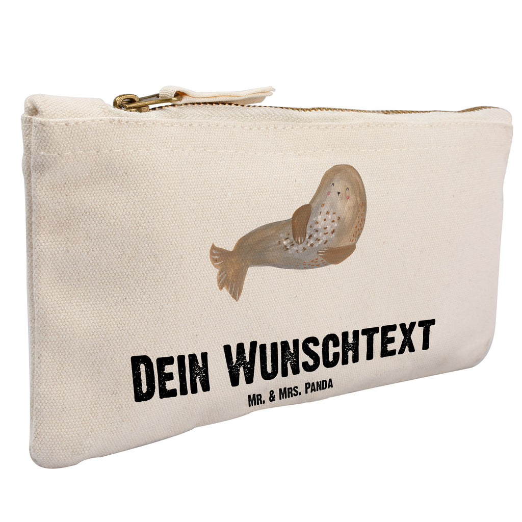 Personalisierte Schminktasche Robbe lachend Personalisierte Schminktasche, Personalisierte Kosmetiktasche, Personalisierter Kosmetikbeutel, Personalisiertes Stiftemäppchen, Personalisiertes Etui, Personalisierte Federmappe, Personalisierte Makeup Bag, Personalisiertes Schminketui, Personalisiertes Kosmetiketui, Personalisiertes Schlamperetui, Schminktasche mit Namen, Kosmetiktasche mit Namen, Kosmetikbeutel mit Namen, Stiftemäppchen mit Namen, Etui mit Namen, Federmappe mit Namen, Makeup Bg  mit Namen, Schminketui mit Namen, Kosmetiketui mit Namen, Schlamperetui mit Namen, Schminktasche personalisieren, Schminktasche bedrucken, Schminktasche selbst gestalten, süße Tiermotive, gute Laune, lustige Sprüche, Tiere, Robbe, Robben, Seehund, Strand, Meerestier, Ostsee, Nordsee