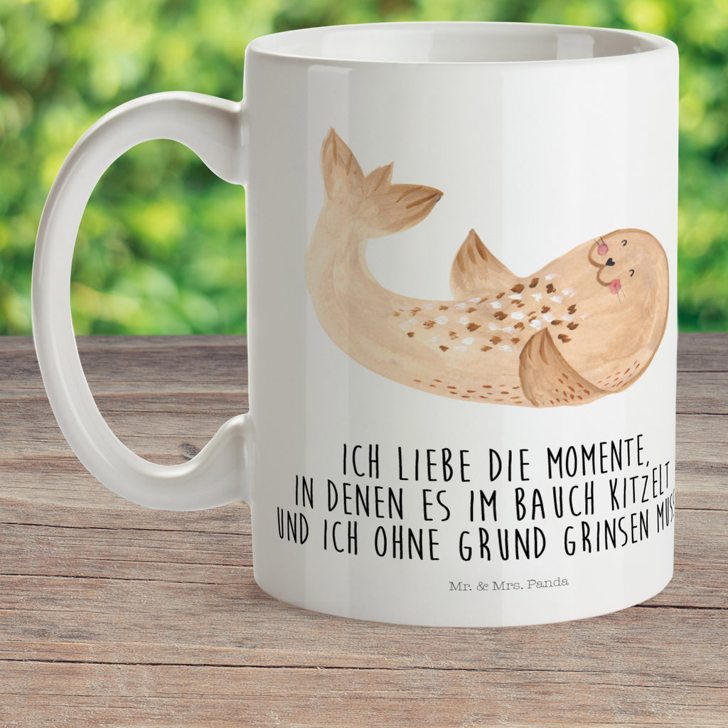 Kindertasse Robbe liegend Kunststoff Tasse, Kindergarten, Tasse, Trinkbecher, Camping Becher, Kaffeetasse, Kunststoffbecher, Kindergartenbecher, Outdoorgeschirr, Kunststoffgeschirr, Reisebecher, Reisetasse, Kinderbecher, Tiermotive, Gute Laune, lustige Sprüche, Tiere, Robbe, Robben, Seehund, Strand, Meerestier, Ostsee, Nordsee, Lachen, Freude