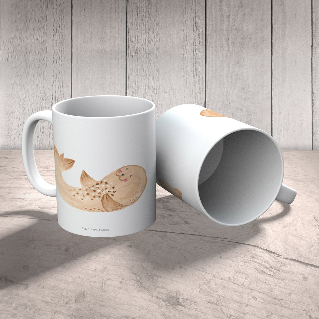 Kindertasse Robbe liegend Kunststoff Tasse, Kindergarten, Tasse, Trinkbecher, Camping Becher, Kaffeetasse, Kunststoffbecher, Kindergartenbecher, Outdoorgeschirr, Kunststoffgeschirr, Reisebecher, Reisetasse, Kinderbecher, Tiermotive, Gute Laune, lustige Sprüche, Tiere, Robbe, Robben, Seehund, Strand, Meerestier, Ostsee, Nordsee, Lachen, Freude