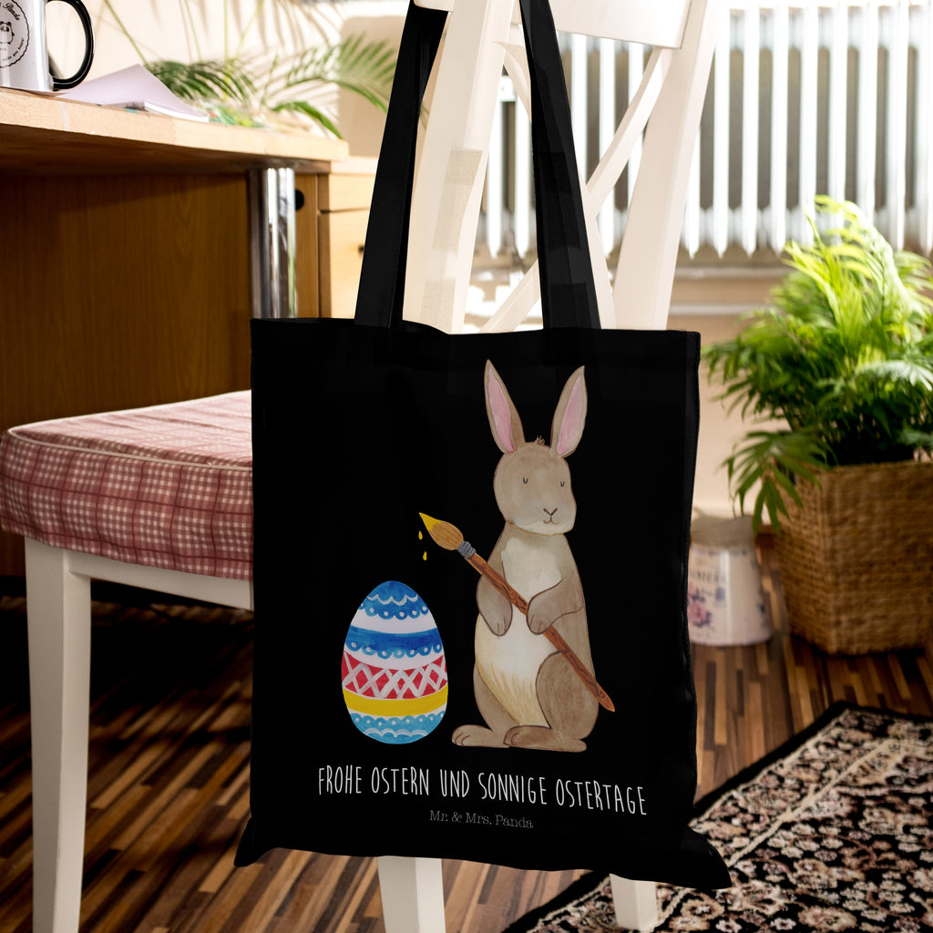 Tragetasche Hase Eiermalen Beuteltasche, Beutel, Einkaufstasche, Jutebeutel, Stoffbeutel, Ostern, Osterhase, Ostergeschenke, Osternest, Osterdeko, Geschenk zu Ostern, Frohe Ostern, Ostergrüße, Osterblume, Osterei, bemalte Ostereier, Hase, Kaninchen, Eiermalen