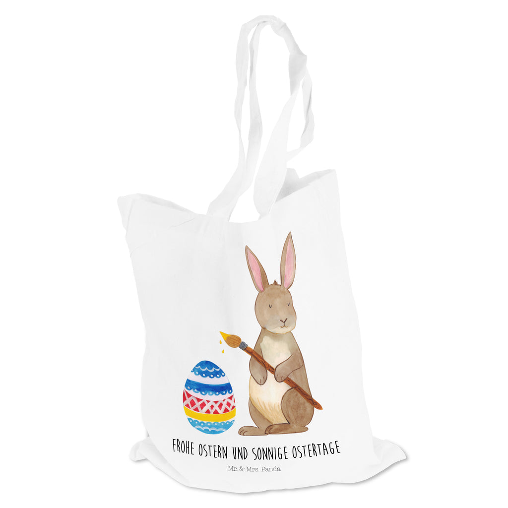 Tragetasche Hase Eiermalen Beuteltasche, Beutel, Einkaufstasche, Jutebeutel, Stoffbeutel, Ostern, Osterhase, Ostergeschenke, Osternest, Osterdeko, Geschenk zu Ostern, Frohe Ostern, Ostergrüße, Osterblume, Osterei, bemalte Ostereier, Hase, Kaninchen, Eiermalen