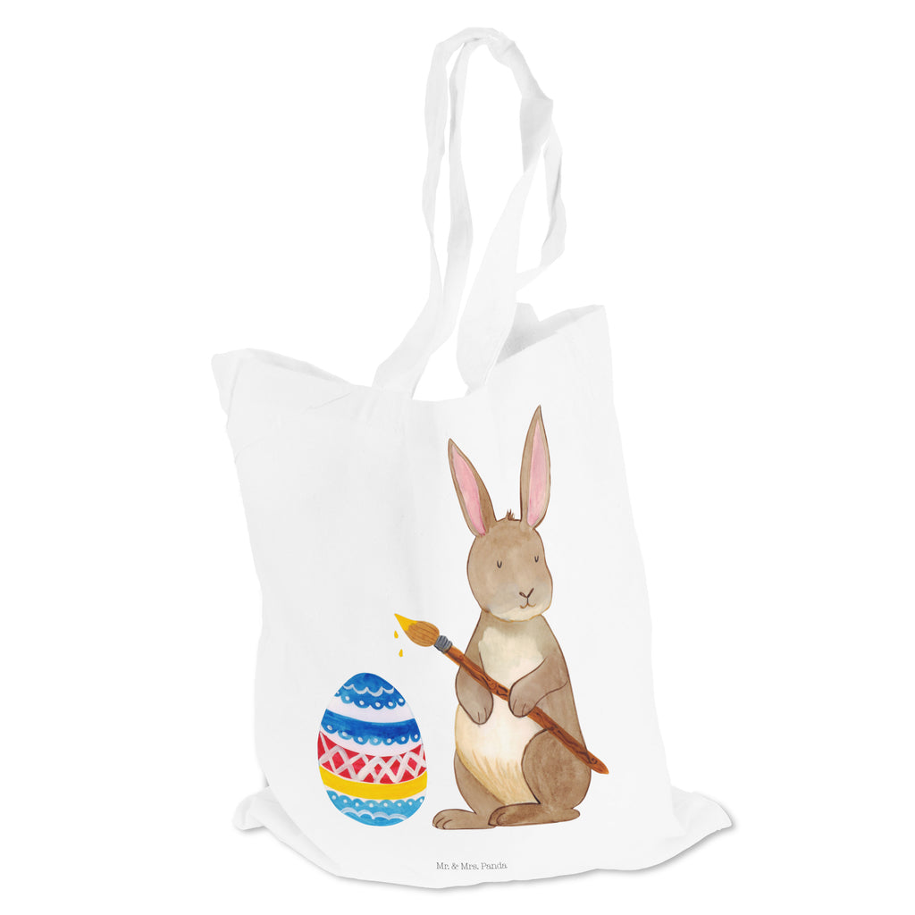 Tragetasche Hase Eiermalen Beuteltasche, Beutel, Einkaufstasche, Jutebeutel, Stoffbeutel, Ostern, Osterhase, Ostergeschenke, Osternest, Osterdeko, Geschenk zu Ostern, Frohe Ostern, Ostergrüße, Osterblume, Osterei, bemalte Ostereier, Hase, Kaninchen, Eiermalen
