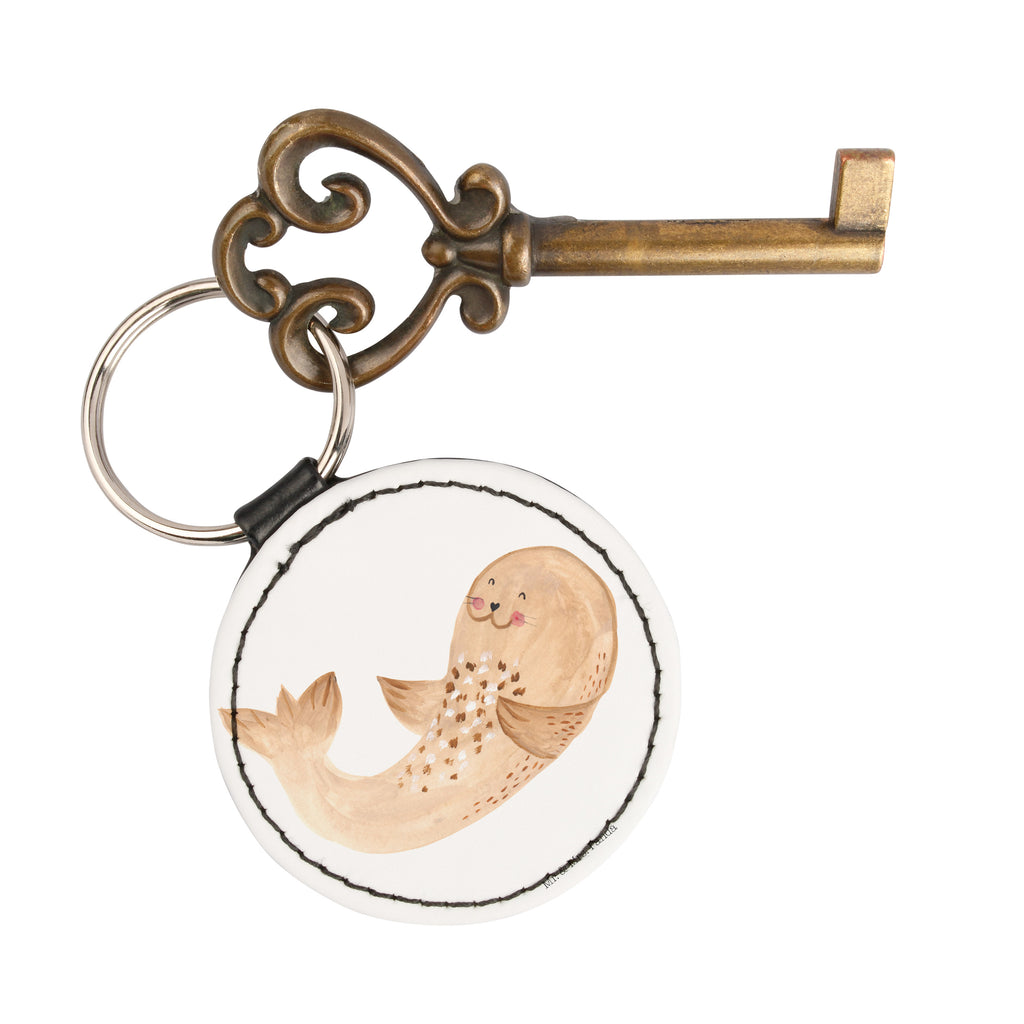 Rund Schlüsselanhänger Robbe liegend Schlüsselanhänger, Anhänger, Taschenanhänger, Glücksbringer, Schutzengel, Tiermotive, Gute Laune, lustige Sprüche, Tiere, Robbe, Robben, Seehund, Strand, Meerestier, Ostsee, Nordsee, Lachen, Freude