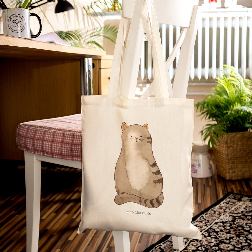 Tragetasche Katze sitzend Beuteltasche, Beutel, Einkaufstasche, Jutebeutel, Stoffbeutel, Katze, Katzenmotiv, Katzenfan, Katzendeko, Katzenfreund, Katzenliebhaber, Katzenprodukte, Katzenartikel, Katzenaccessoires, Katzensouvenirs, Katzenliebhaberprodukte, Katzenmotive, Katzen, Kater, Mietze, Cat, Cats, Katzenhalter, Katzenbesitzerin, Haustier, Katzenliebe, Lebensinhalt, Liebe, Mittelpunkt, Familie