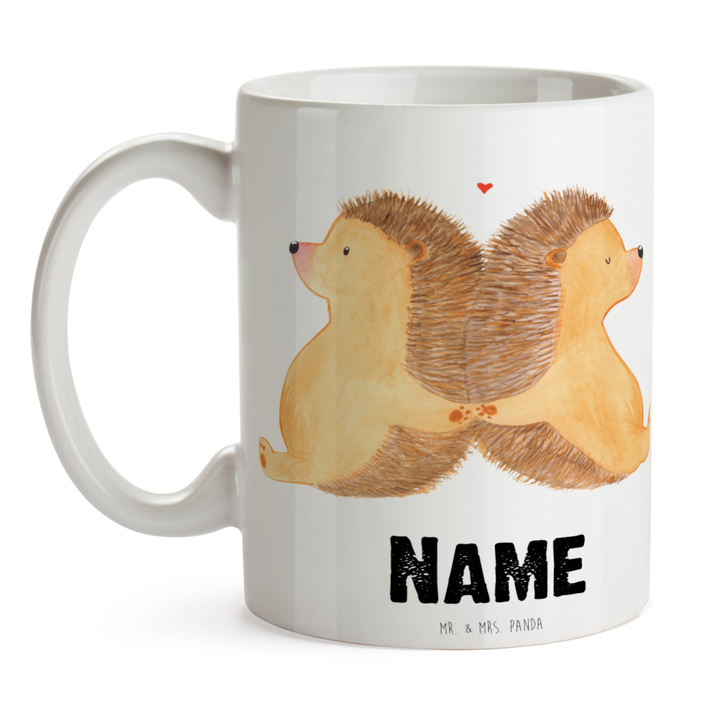 Personalisierte Tasse Igel händchenhaltend Personalisierte Tasse, Namenstasse, Wunschname, Personalisiert, Tasse, Namen, Drucken, Tasse mit Namen, Liebe, Partner, Freund, Freundin, Ehemann, Ehefrau, Heiraten, Verlobung, Heiratsantrag, Liebesgeschenk, Jahrestag, Hocheitstag, Igel, Igelliebe, Hand in Hand, Liebesbeweis, große Liebe, Liebesbotschaft, Hochzeit, Lieblingsmensch, Gemeinsamkeit, Love, Geschenk für zwei