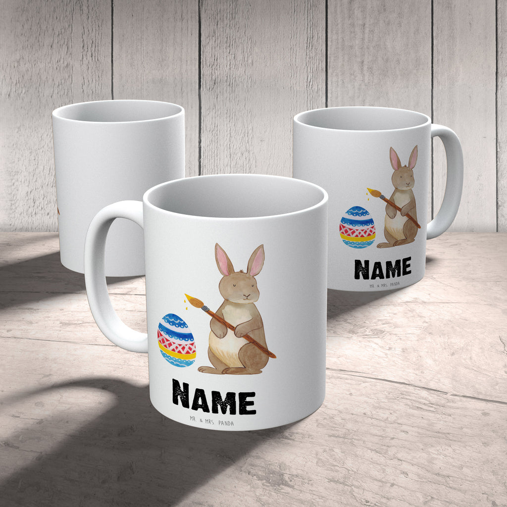 Personalisierte Tasse Hase Eiermalen Personalisierte Tasse, Namenstasse, Wunschname, Personalisiert, Tasse, Namen, Drucken, Tasse mit Namen, Ostern, Osterhase, Ostergeschenke, Osternest, Osterdeko, Geschenk zu Ostern, Frohe Ostern, Ostergrüße, Osterblume, Osterei, bemalte Ostereier, Hase, Kaninchen, Eiermalen